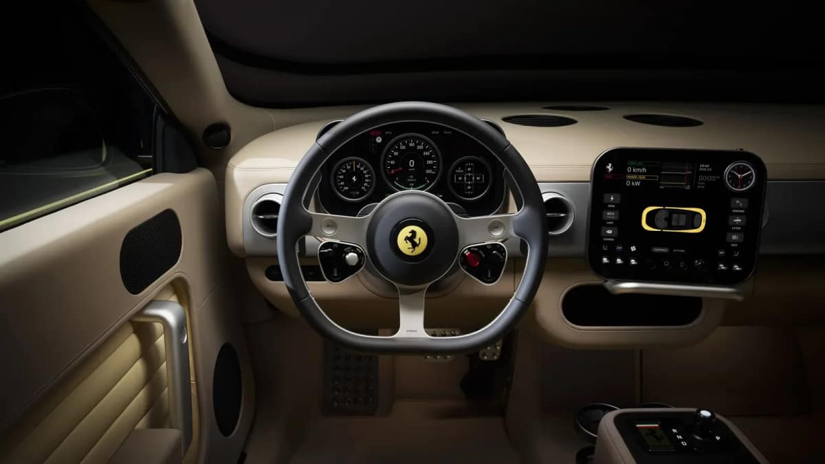 Ferrari Luce cabin with a round dial driver display, aluminium steering wheel and a small centre screen