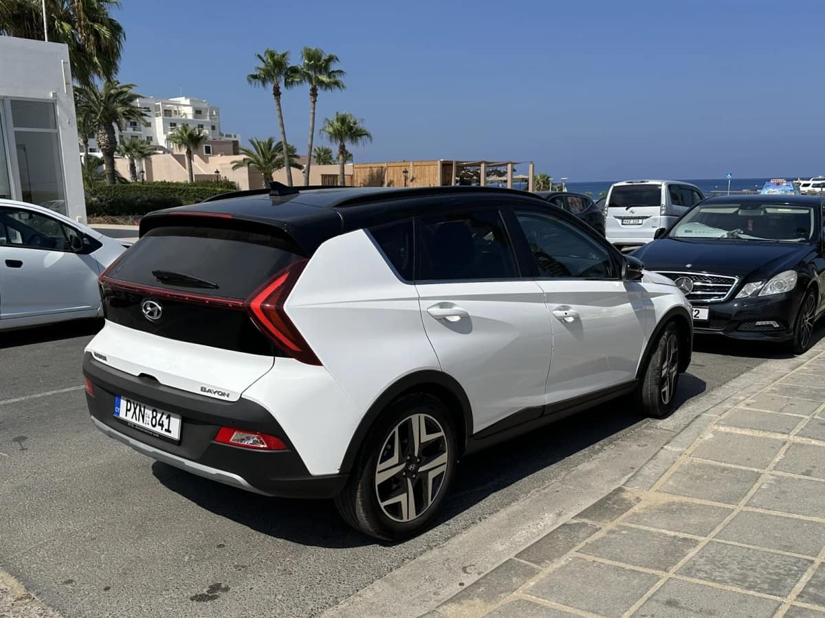 Hyundai Bayon crossover parked on a street, international model