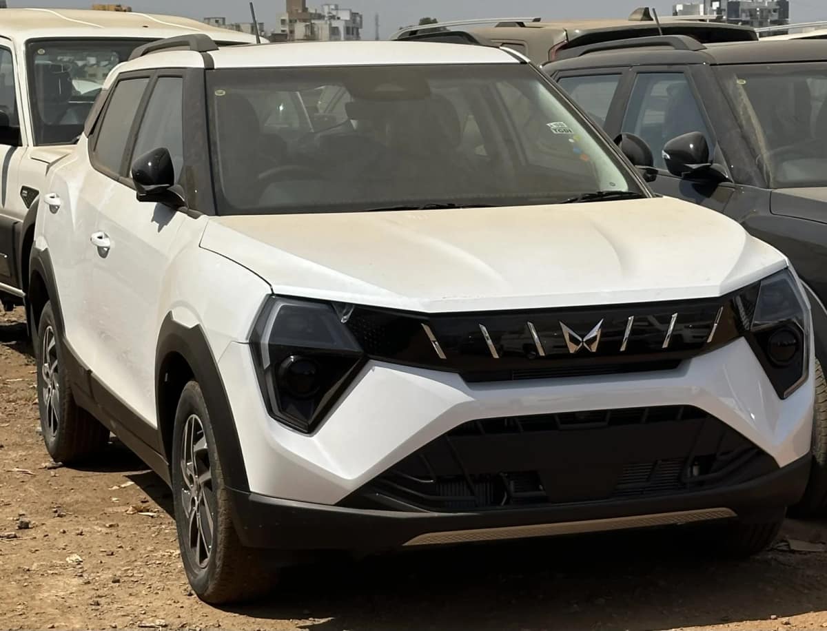 Mahindra XUV 3XO compact SUV parked, side profile