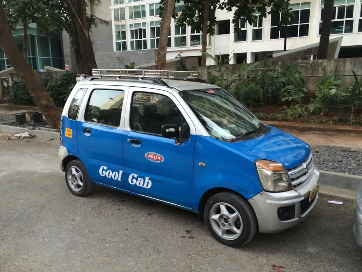 Blue Maruti Suzuki Wagon R used as a Cool Cab taxi parked in Mumbai