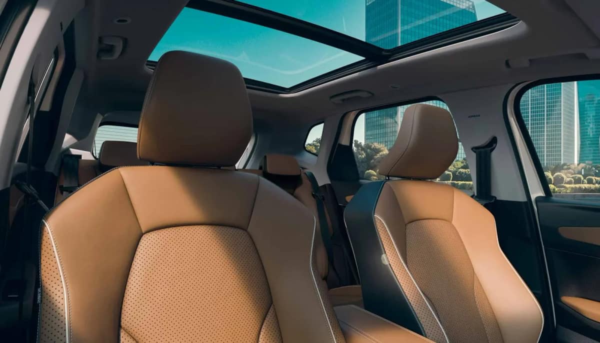 Brown seats and the panoramic sunroof inside the Renault Duster hybrid