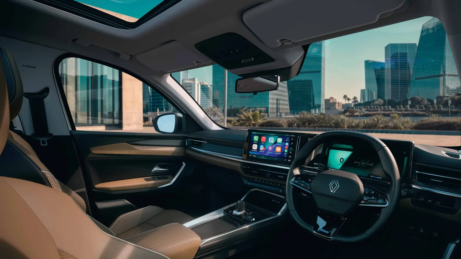 Cabin of the Renault Duster hybrid with dune brown leatherette seats, touchscreen and sunroof