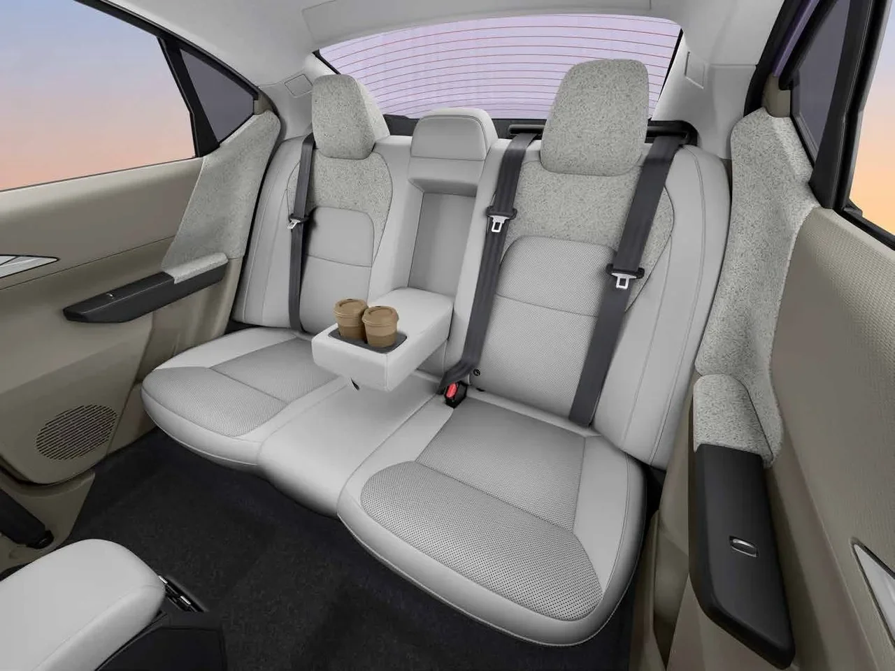 Rear seat of the Tata Aeris with centre armrest and cupholders